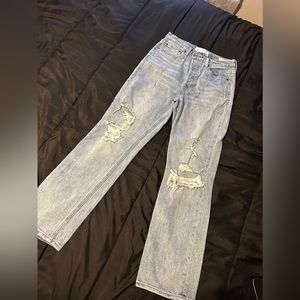 Jeans were never worn they did not fit.